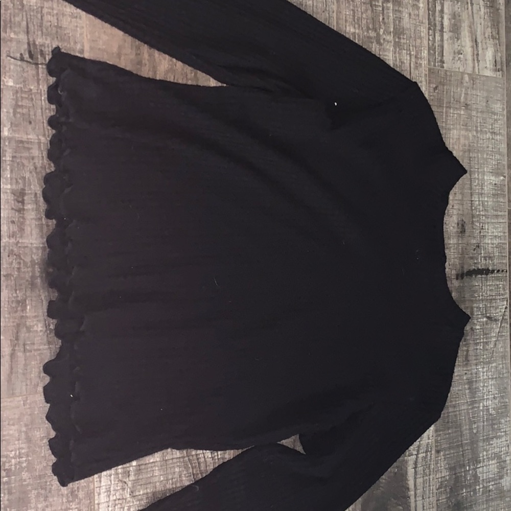 Long sleeved lettuce hemmed shirt